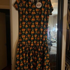 Dot Dot Smile Kids Dress with Orange and Yellow “turkey” pattern